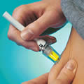 Needle-less syringe in use
