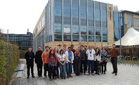 Group of students and staff outside the Cambridge Graphene Centre